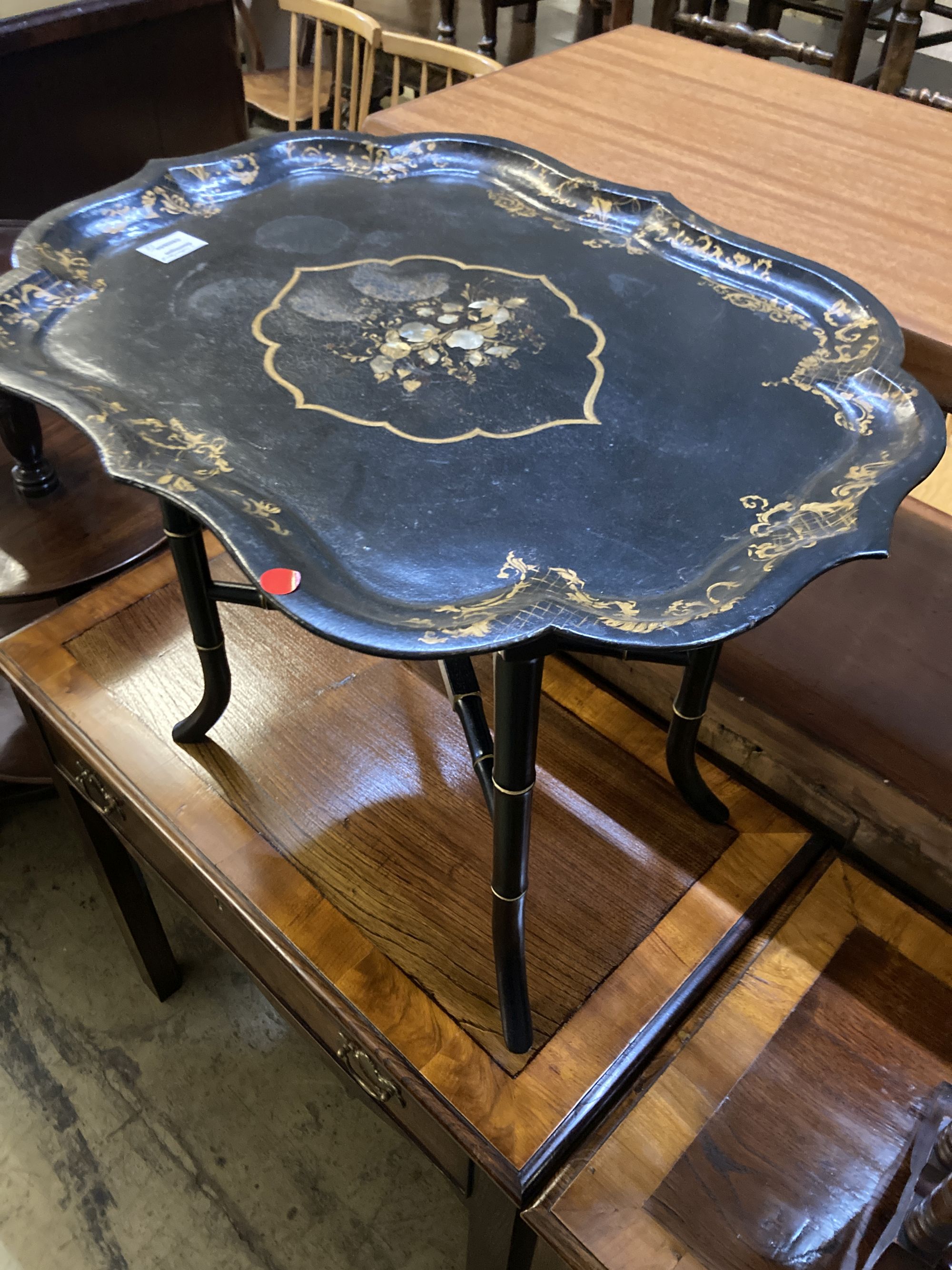 A small Victorian papier mache tray top table, width 64cm, depth 50cm, height 50cm together with an Edwardian inlaid Sutherland table